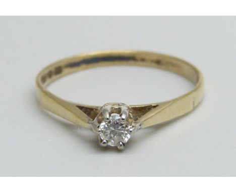 A 9ct gold and diamond solitaire ring, 1g, L 