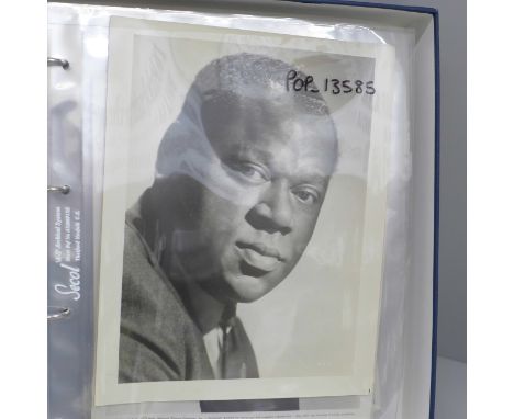 Press photographs and magazine issues, 1890-1960s including Nat King Cole, Liberace, George VI and family, Elizabeth II, Joe 