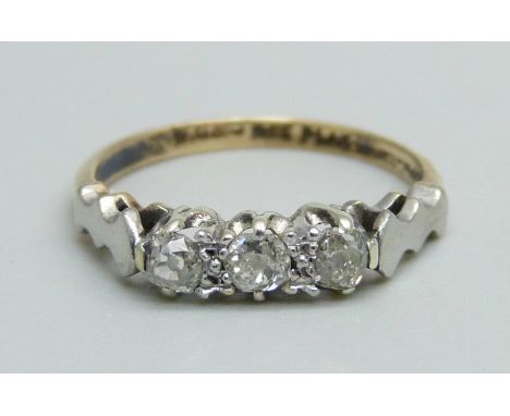 A 9ct gold, platinum and diamond trilogy ring, 1.8g, J 