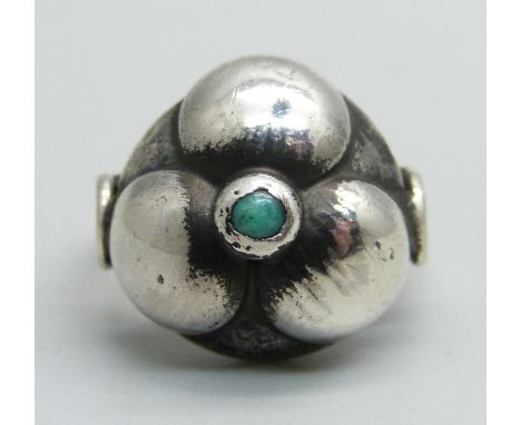 An Arts and Crafts silver ring, Polish marks on outer shank, J 