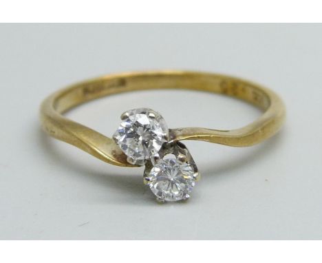 A 9ct gold, two stone diamond crossover ring, 1.4g, M 