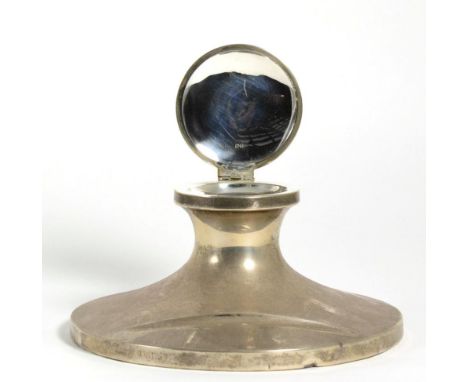 An Oversized George V Silver Capstan Inkwell, probably mark of George Nathan & Ridley Hayes, Chester 1910, with a pen depress