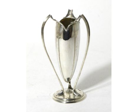 An Edwardian Art Nouveau Silver Posy Vase, Walker & Hall, Sheffield 1905, the torpedo shaped vase on three slender stylised s