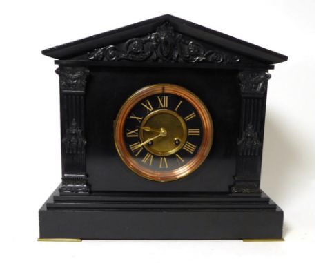 A black slate striking mantel clock, retailed by J & W Mitchell, Glasgow