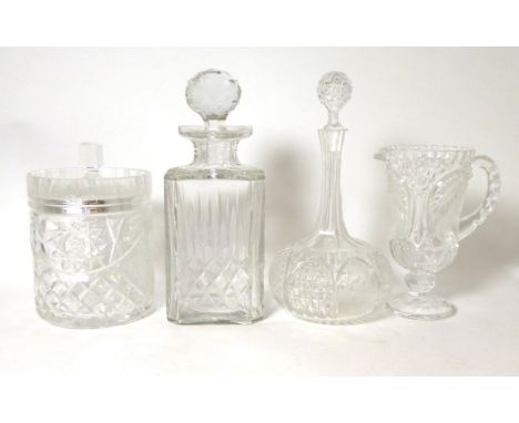 An Edinburgh Crystal square cut glass decanter; a biscuit barrel; decanter and jug