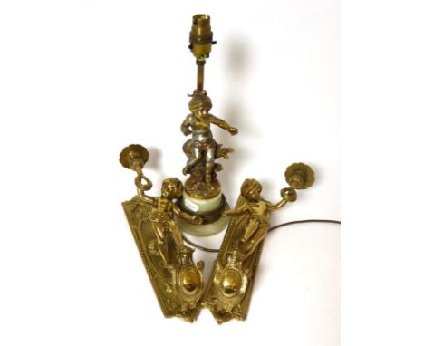 Pair of cast brass wall sconces modelled as putti; and a gilt metal table lamp after the model by Moreau