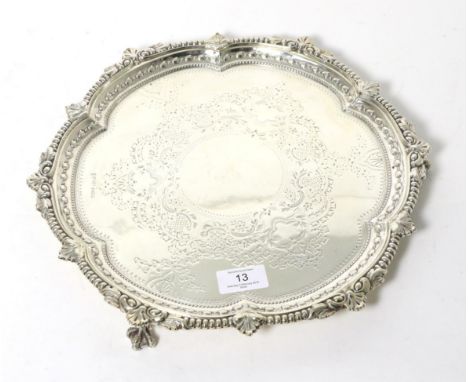 A Late Victorian Silver Salver, Jenkins & Timm, Sheffield 1899, the shaped rim with foliate and bead borders, the centre with
