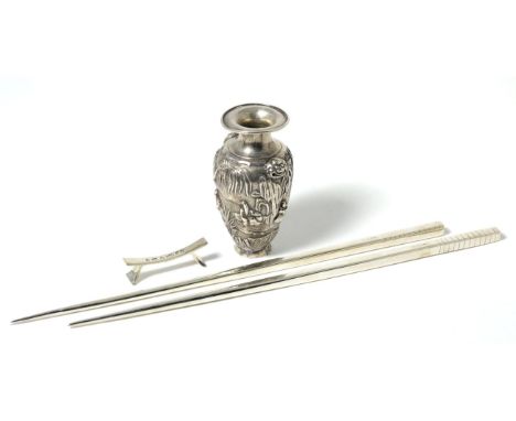 A Small Chinese Export Silver Vase, Wang Hing, circa 1900, decorated in relief with figures in a landscape; and A Pair of Mod
