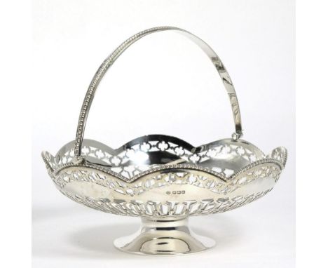 A George V Silver Swing Handled Basket, William Hutton & Sons, Sheffield 1918, circular with shaped rim, pierced border and s