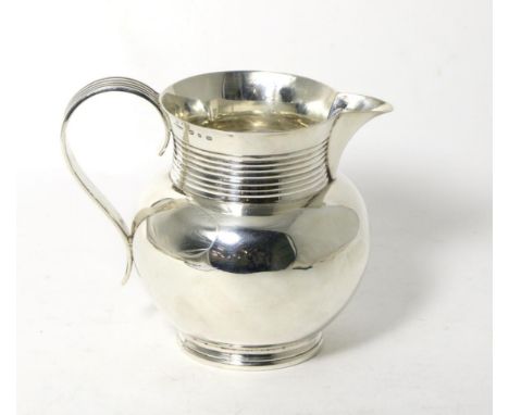 A Late Victorian Silver Water Pitcher or Beer Jug, Plante & Co Ltd, Birmingham 1898, with ribbed neck and fluted scroll handl