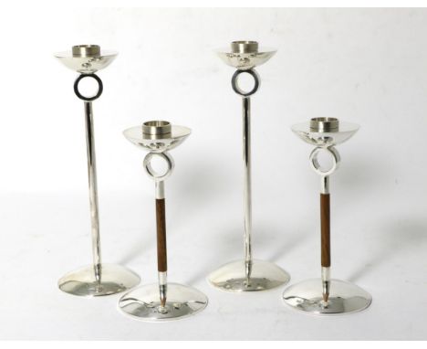 Two Pairs of Contemporary Silver Candlesticks, Shona Marsh, Birmingham 2007, 16cm and 22cm high respectively, 13ozt weighable