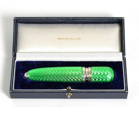 A Modern Silver and Green Guilloche Enamel Travelling Perfume Dispenser, maker's mark FGK, London 2010, with pull off cover, 