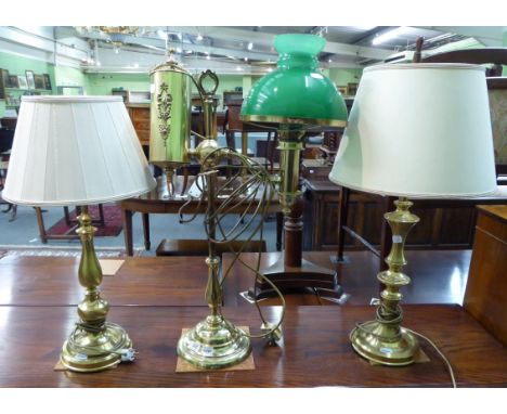 Three various brass table lamps, one in the form of an oil lamp 