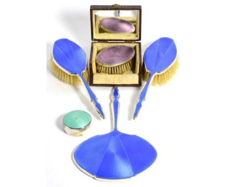 A Group of Silver and Guilloche Enamel Dressing Table Items, comprising: A Mirror and Two Brushes, Birmingham 1933; An Oval B