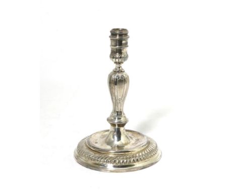 A Modern Cast Silver Candlestick of 18th Century Style, Camelot Silverware Ltd, Sheffield 1993, with baluster stem on a circu