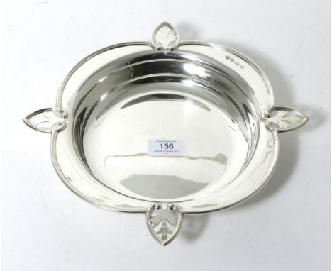 A Shaped Circular Silver Dish, William Hutton & Sons, Sheffield 1928, the rim with four pierced foliate points, 28cm wide, 16
