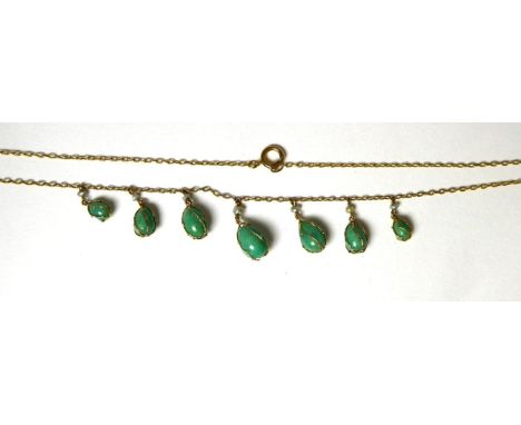 An amazonite and seed pearl fringe necklace, seven graduated amazonite drops in cage settings, spaced by seed pearls to a fin
