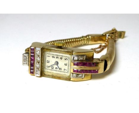 A lady's 9ct gold ruby and diamond set wristwatch