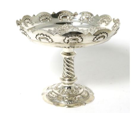 A Victorian Silver Tazza, Richard Martin & Ebenezer Hall, London 1881, the bowl with shaped rim and repousse decoration, on a