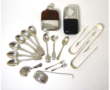 A set of six Victorian silver fiddle pattern teaspoons; three pairs of sugar tongs including Newcastle; a plated hip flask an