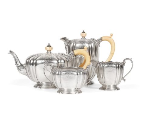 A Silver Four Piece Tea Service, Adie Brothers, London 1938, circular with fluted sides and decoratively engraved rim, the te