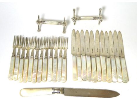 Silver and mother of pearl fruit knives and forks, twelve forks and eleven knives; a silver plated cake knife and a pair of k