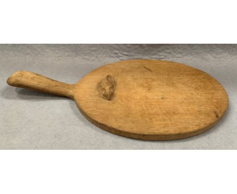 A Robert Thompson of Kilburn Mouseman oval cheese board with handle 26 x 19cm  Further Information The board is tired but no 