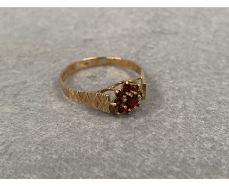 A 9ct gold 8 stone ruby dress ring 