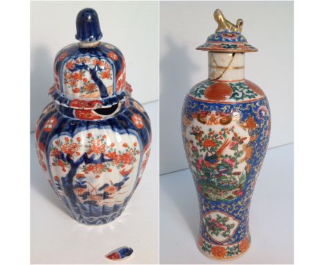 A Chinese famille rose slender baluster vase and cover, polychrome painted with birds and flowers on a predominantly blue gro