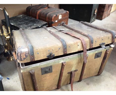 A light brown canvas vehicle travelling trunk 90 x 52 x 48cm initialled M.B 