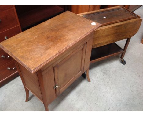 A mahogany single door side cabinet, an oak dinner wagon and a small oak tray (3) 