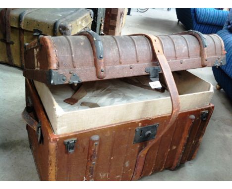 A brown fibre dome top trunk with label Barker and Sons, Leeds complete with inner tray 66 x 47 x 44cm high initialled B.W 