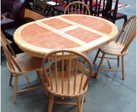 Light oak finish extending brown tile top dining table 107 x 148cm extended and four rail back dining chairs 