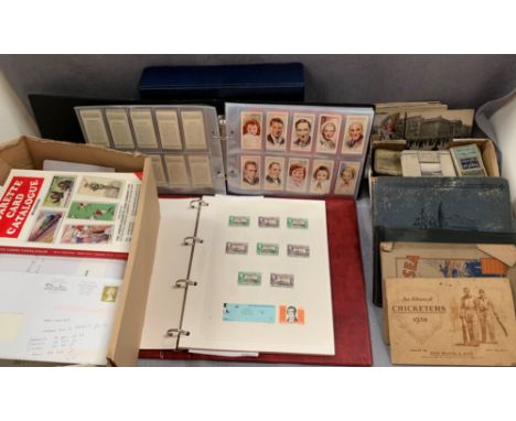 A stamp album containing Commonwealth and other stamps and quantity of loose part and full packs of cigarette cards - complet