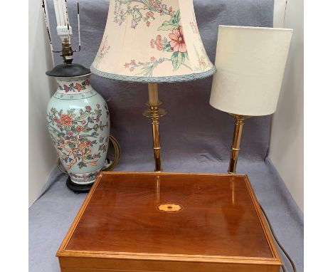 Two brass table lamps, pottery table lamp - failed earth test, and a pine box containing a small quantity of CDs (4)