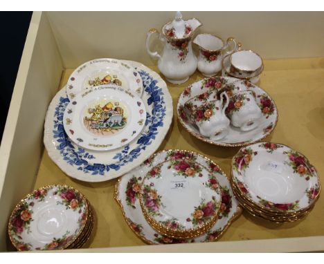 Twenty nine pieces of Royal Albert Country Roses tea service, two Royal Doulton 'Winnie the Pooh' plates and a Wedgwood Bramb