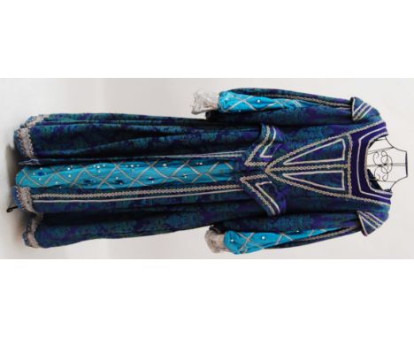 TUDOR: A Tudor court style ladies blue / turquoise brocade dress, trimmed with pearls and rhinestones . Approx size 18


NOTE