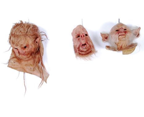 MASKS: A group of 3 grotesque latex masks, bespoke made for theatre production. Hand finished pieces of art in themselves.

N