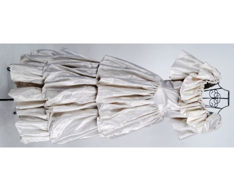VICTORIAN BALL DRESS: A Victorian style oyster satin ball dress with flowing skirt.


NOTE: From a large private collection o