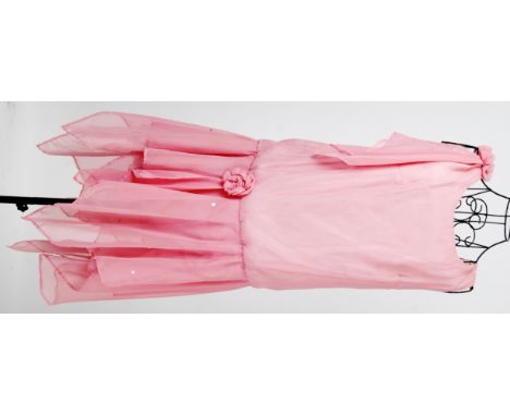 FLAPPER DRESS: A 1920's style pink chiffon Flapper dress with sequin detail to skirt .


NOTE: From a large private collectio
