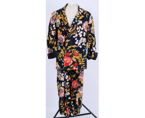 MAX MILLER: An original 1940's Max Miller style 2 piece suit. In typical style, with bright floral print to the jacket and tr