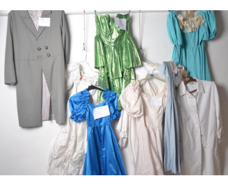 10x COSTUMES: Mixed group of 10 costumes / outfits -some fully complete some pat outfits to include : 
-Light blue frilled dr