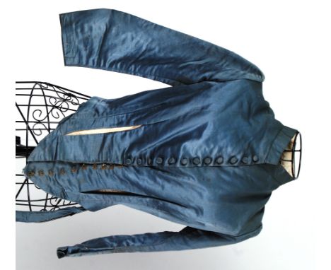 VICTORIAN JACKET: A Victorian silk fully lined fitted and waisted jacket with original silk covered buttons , boned to the fr