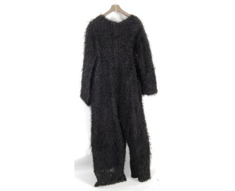 GORILLA COSTUME: A full length Pantomime faux fur gorilla costume in black.

NOTE: From a large private collection of assorte