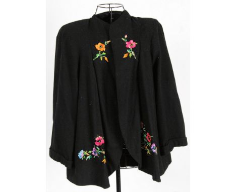 CAPE: An original vintage 1940's wool cape with floral hand embroidery. Some moth damage.

NOTE: From a large private collect