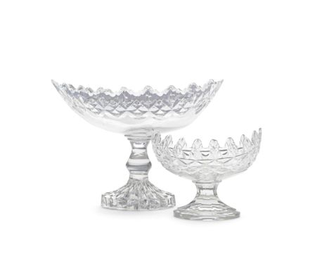 Two Irish (Cork) cut glass standing bowls or centrepieces, circa 1790-1800With deep boat-shaped bowls cut with elaborate cren