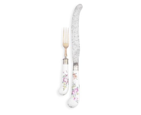 A pair of Worcester knife and fork handles, circa 1760The hafts of pistol shape, painted with colourful Meissen-style flowers