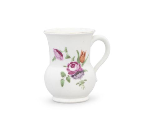 A very rare Worcester toddy cup, circa 1768Of thistle shape, the plain handle with a kick at the lower terminal, painted with