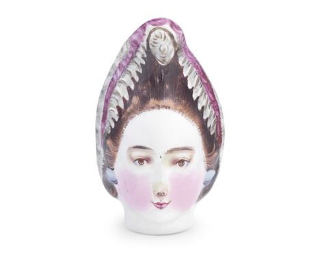 A South Staffordshire enamel 'Flora MacDonald' bonbonniere, circa 1765-70Modelled as the head of a lady, wearing blue earring