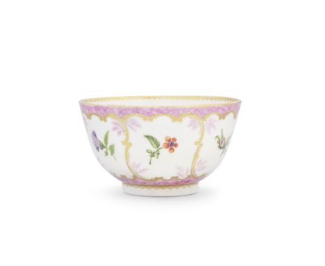 A very rare Worcester teabowl, circa 1775Decorated in Sèvres style with six gilt scroll-edged panels reserving flower sprigs 